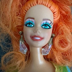 Barbie makeover by artist, Ann Miele.  Full re-root, vintage fashion, boots, jewelry; Repaint