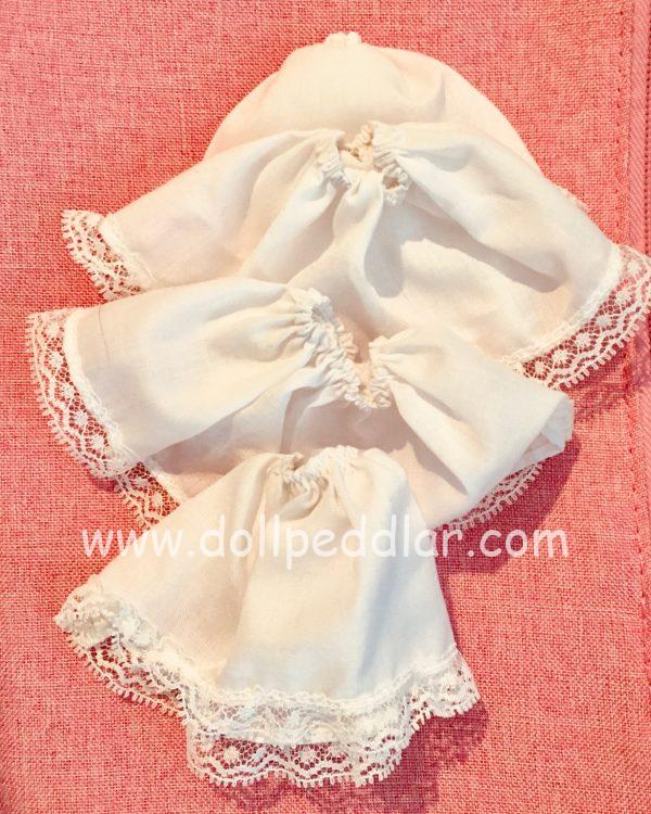 White slips with lace edging. 35 mm waist x 55mm length