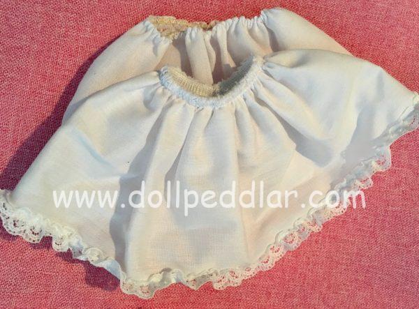 White Slip with lace edging. 45mm waist x 70mm length