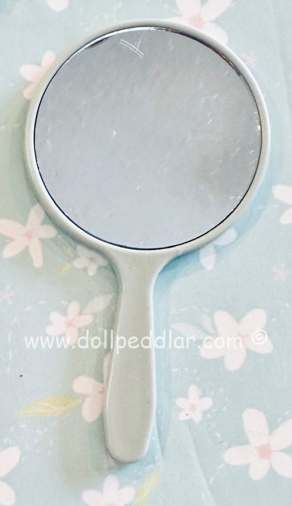 Vanity Mirror   4" length. Mirror diameter 2" Mint condition