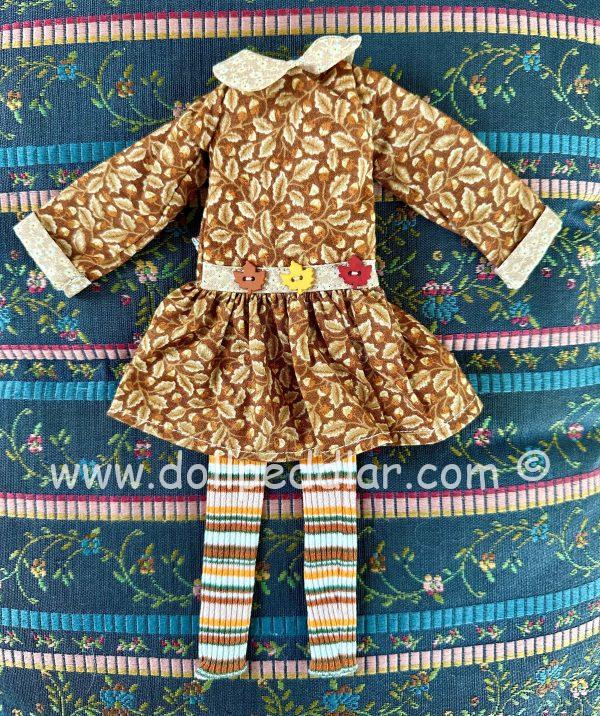 Dress & tights reminiscent of Autumn   Patterns: leaves, stripe tights, tan print cuffs.  fits 10" Dolls
